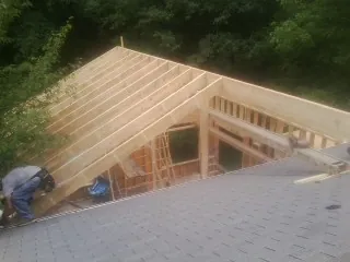 Framing a new roof addition that ties into an existing shingle roof in Castleton On Hudson